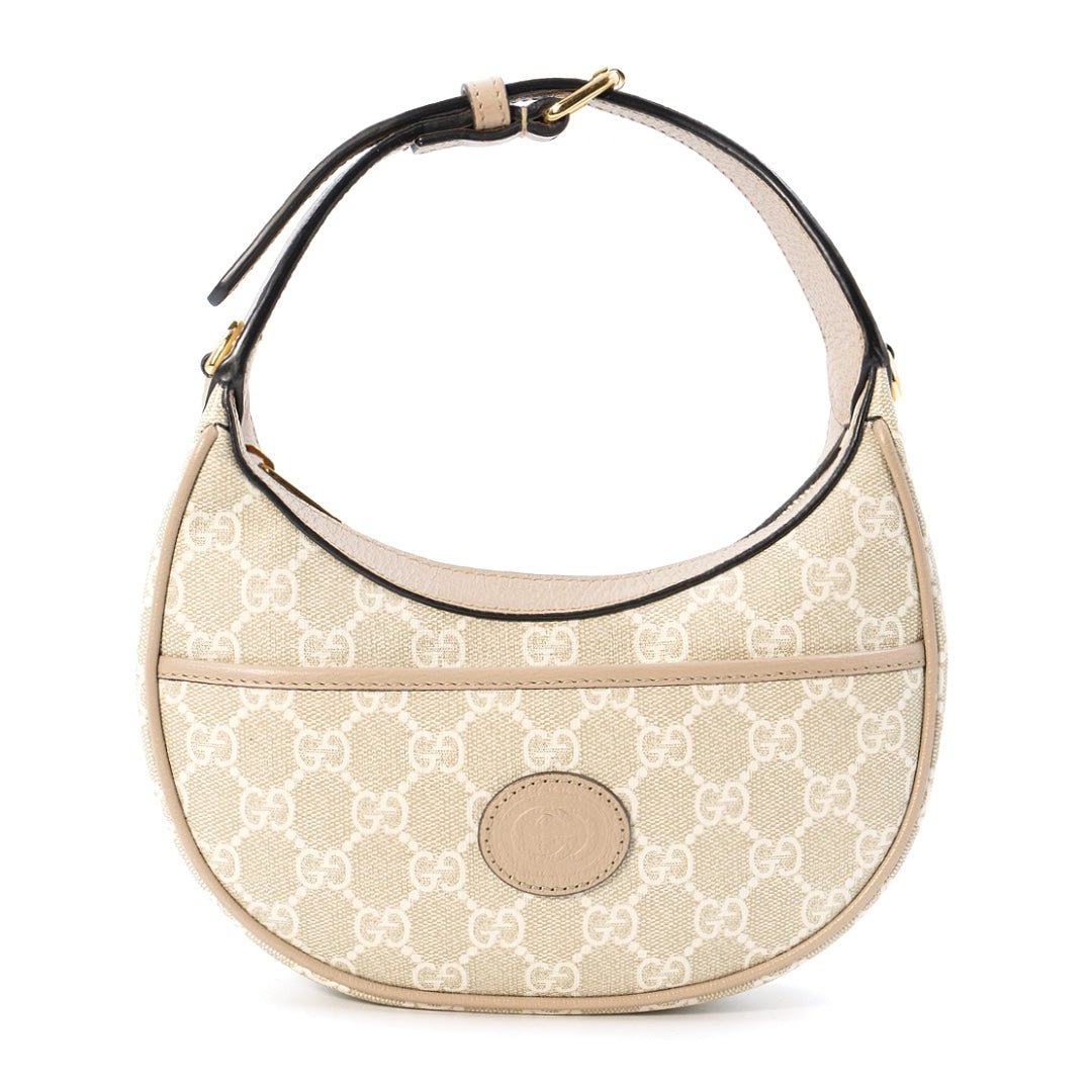 GUCCI GG Half-Moon-Shaped Mini Bag in beige GG Supreme canvas with leather trim